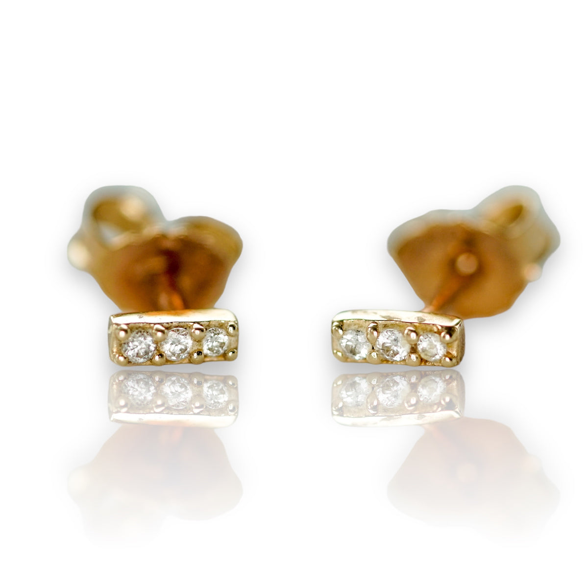 3 diamond gold earrings