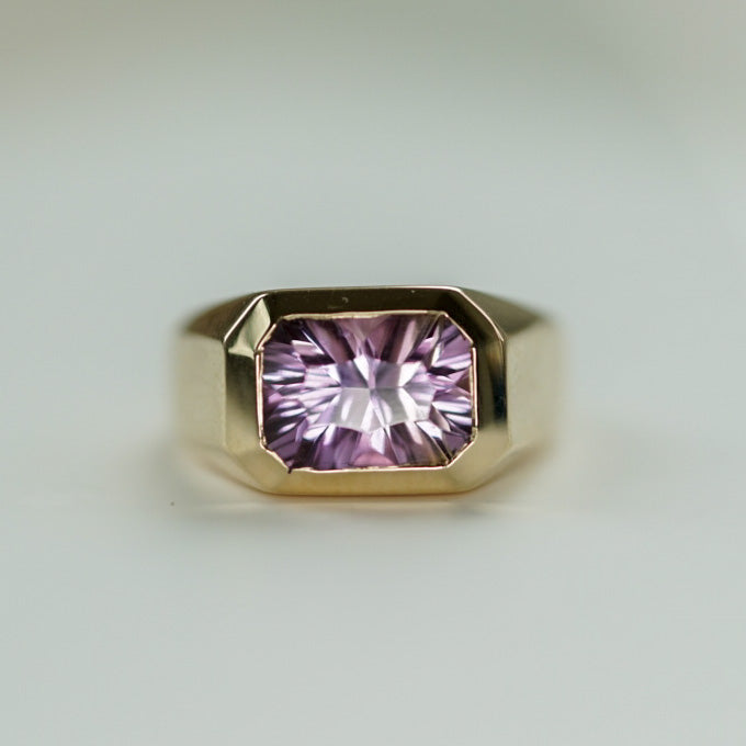 modern ring in gold set with an octagon ametrine 