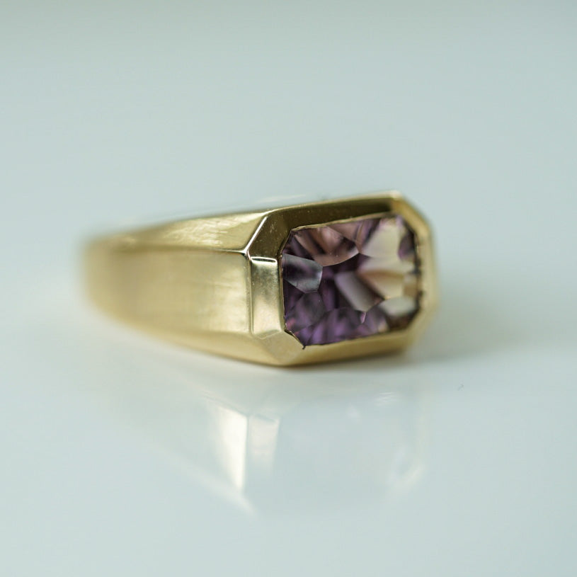 modern ring in gold set with an octagon ametrine 