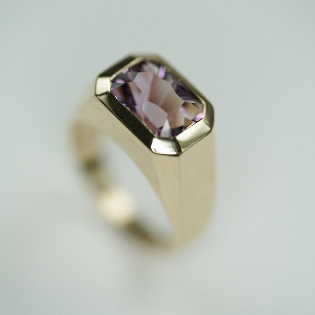 modern ring in gold set with an octagon ametrine 