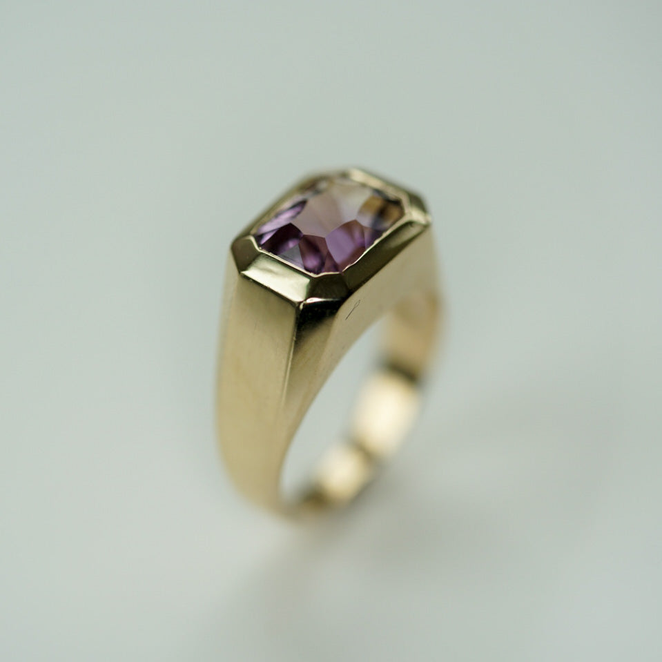 modern ring in gold set with an octagon ametrine 
