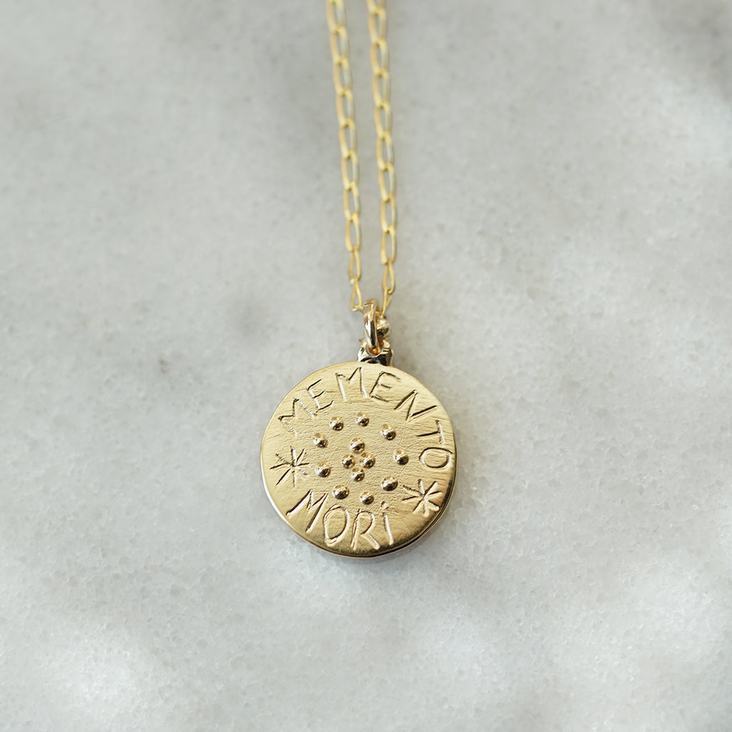Memento mori gold discount pendant