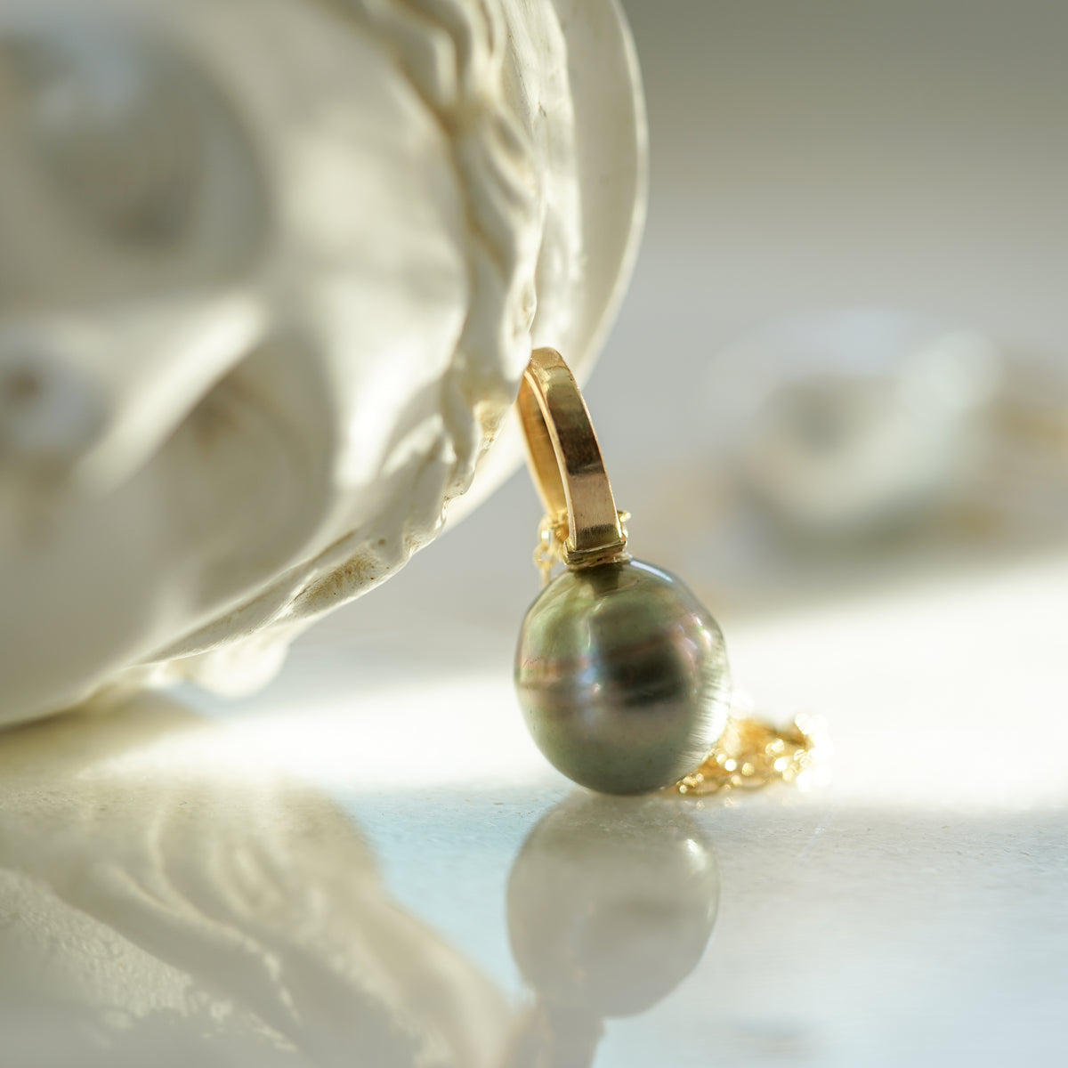 Tahitian Pearl gold necklace on leather cord