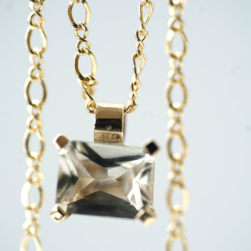 White beryl gold necklace