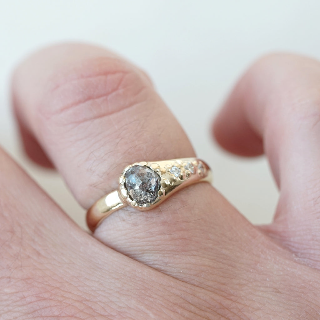 Heart shaped salt and pepper diamond on hand