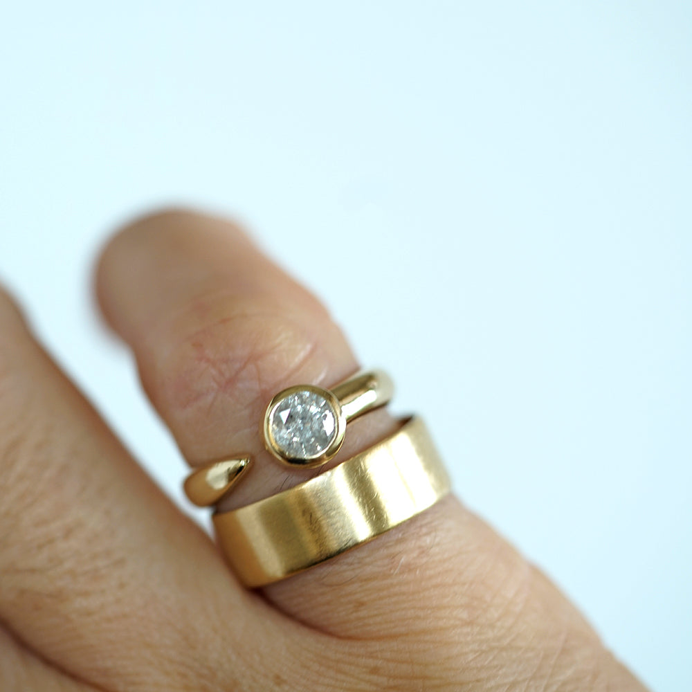 Open solitaire diamond ring