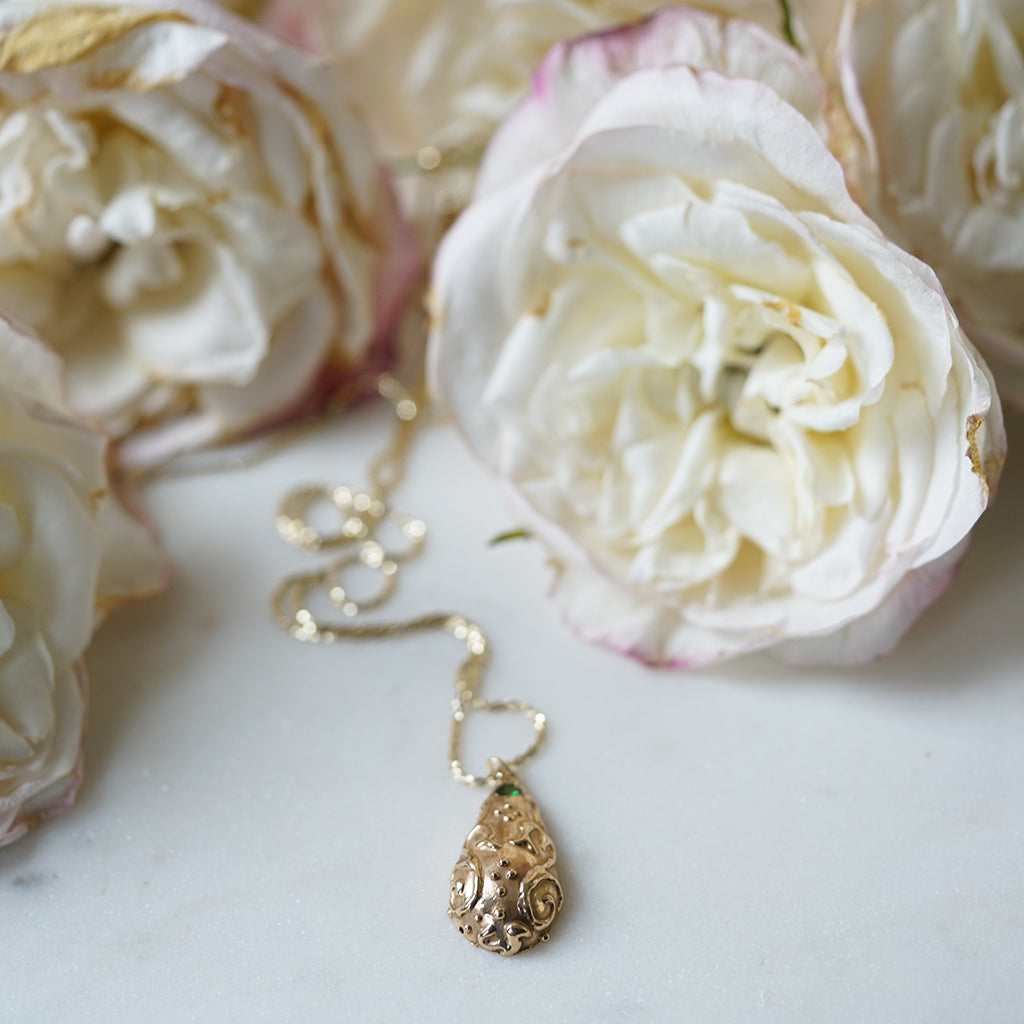 Pear Shape gold romanesque necklace with tsavorite