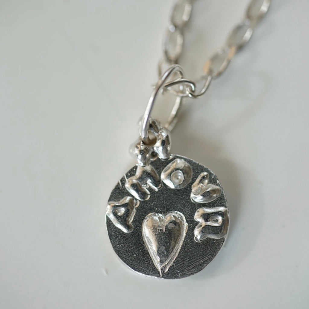 Amour medallion silver necklace