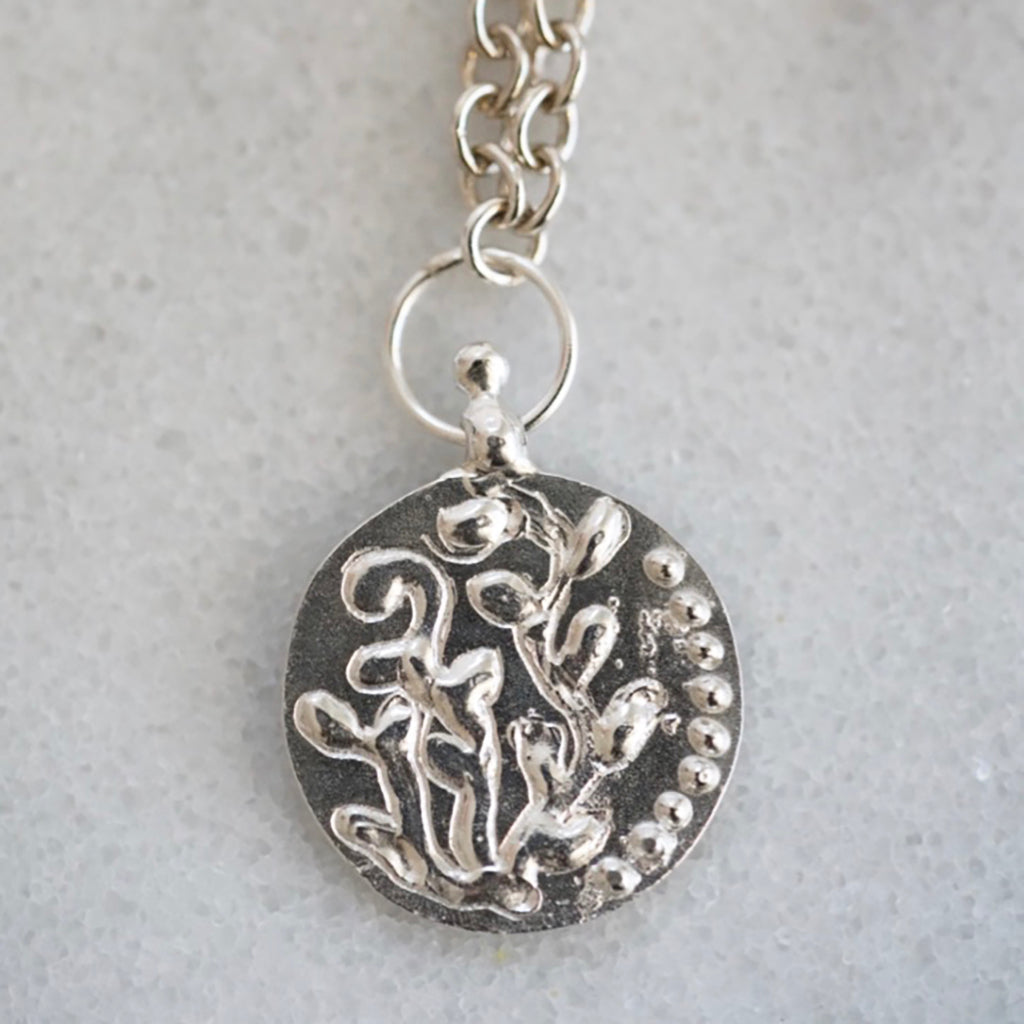 Floral medallion silver