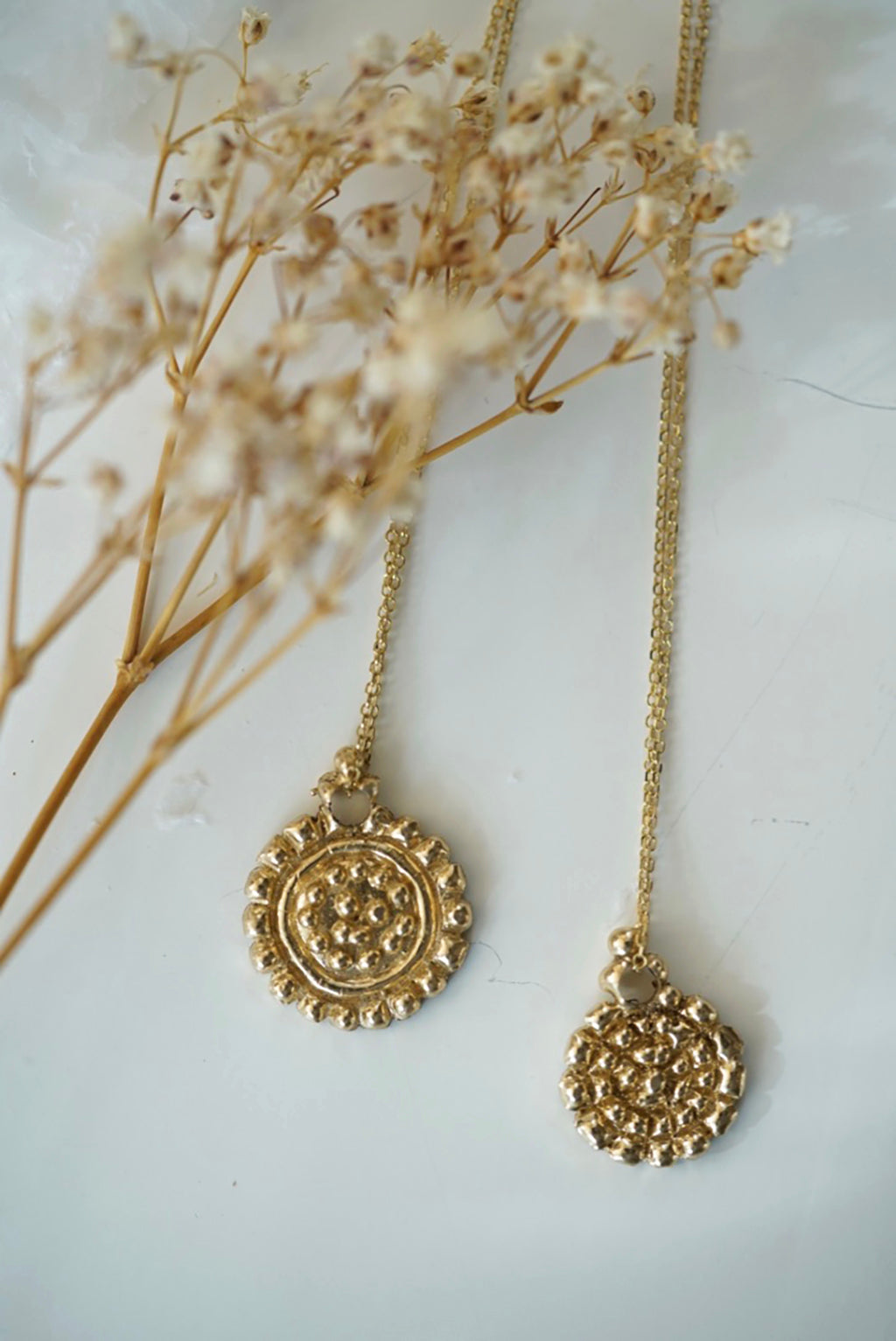 Small dots gold medallion